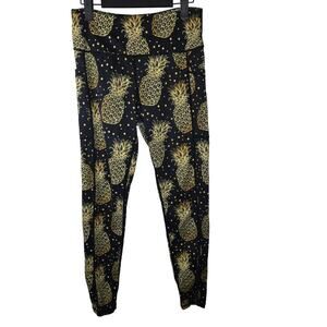 CVG Constantly Varied Gear Black and Yellow Pineapple Leggings Size Medium